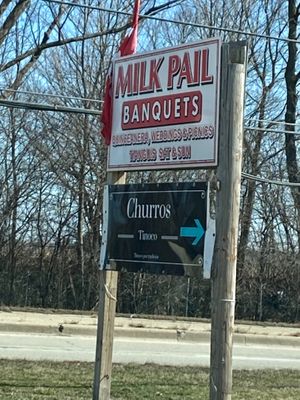 Here’s the sign on the road at Churros Tinoco in East Dundee