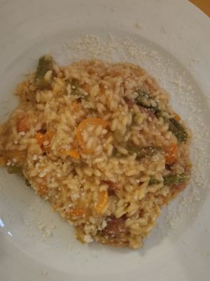 Traditional Italian cuisine: Mushroom risotto  at Circolo Arci Impatto Zero in Pavia