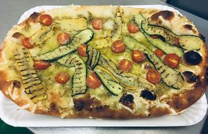 Different types of Veggie Pizzas at Circolo Arci Impatto Zero in Pavia