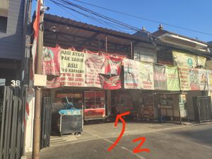 Go under the roof towards the middle at Velan Express in Surabaya