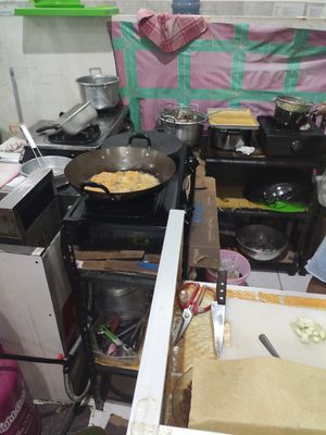 Cooking our food at Velan Express in Surabaya