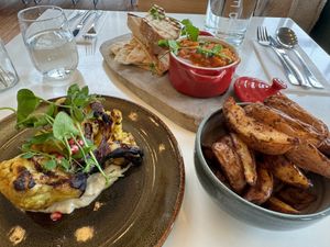 Cauliflower steak, tagine and potato wedges. Be sure to ask for the vegan mayo for the potato’s    at Hotel Casa in Amsterdam