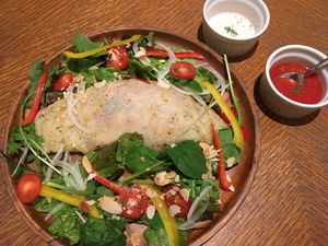 Chickpea flour “omelette” over salad with a side of salt and tomato sauce. at Kitchen Omiya in Nagoya