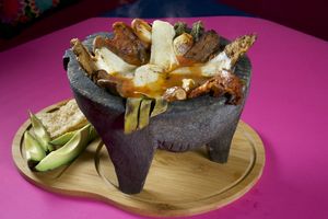 Molcajete (variedad of vegetale meats acompanied by avocado, vegan cheese, nopales and handmade tortillas) at Veggicano Plant Based in Mexico City