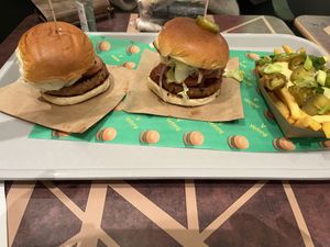 The making of a messy meal! Pretty tasty nonetheless, but nothing to write home about.  at Vedang - green burger | Alexa in Berlin