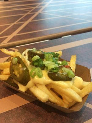 Fries with jalapeños & cheese at Vedang - green burger | Alexa in Berlin