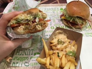 Too hungry for a professional picture - chicken burger, chili cheese fries, and chili cheese burger at Vedang - green burger | Alexa in Berlin