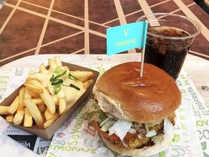 Chick Burger, cheezy fries and Cola Free at Vedang at Vedang - green burger | Alexa in Berlin