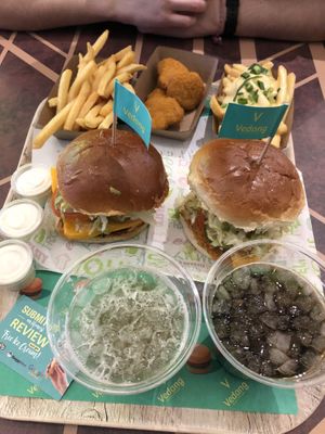 Chicken burger, cheese burger, fries, cheesy fries, nuggets, two drinks and mayo for 26,20€ great value!  at Vedang - green burger | Alexa in Berlin