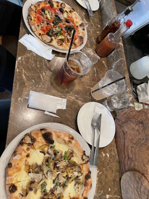 Vegan pizza (left), pizza funghi (right -- ask for no meat)  at 808 Monsmare in Hakone