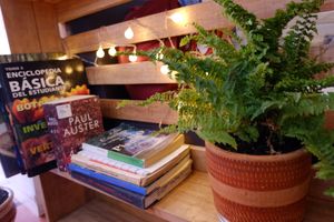 Our small library to accompany your coffee  at Roots in Jardin