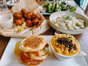 Benedict, cauliflower wings, gnocchi, side salad at Watercourse Foods in Denver