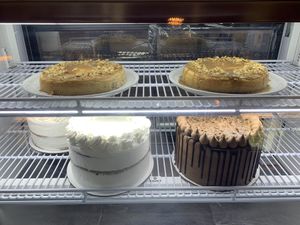 Carrot cake cheesecakes, lemon cake, and German chocolate cake. at Watercourse Foods in Denver