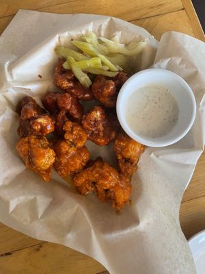cauliflower wings - half buffalo half bbq at Watercourse Foods in Denver