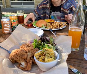Cauliflower fried Chk’n, mac & cheez, classic vegburger at Watercourse Foods in Denver