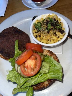 CLASSIC BURGER (GFO, CN)  //  15 

Soy protein, veggie, and walnut patty, lettuce, tomato, pickle, onion on a Challah bun. Mac n cheese side. at Watercourse Foods in Denver