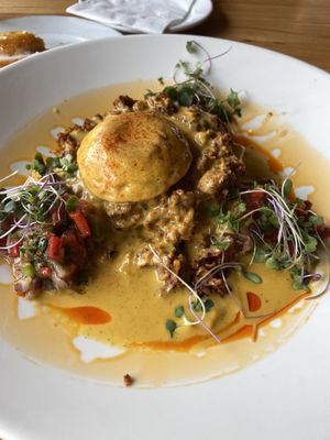 Chorizo and grits  at Watercourse Foods in Denver