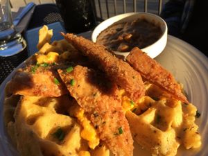 Vegan chicken and waffles at Watercourse Foods in Denver