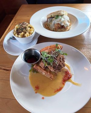 Chicken & Waffles, front, Chicken + Biscuit, back, side of mac & cheese at Watercourse Foods in Denver