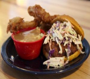po boy: a crispy portobello mushroom cap on a bun topped with chipotle aioli and coleslaw. served with your choice of 2 sides. at Watercourse Foods in Denver
