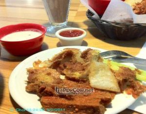 Buffalo wings, onion rings and chocolate shake.  at Watercourse Foods in Denver