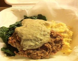 Chicken fried seitan, mashed potatoes, steamed kale and the crappy, sugary gravy at Watercourse Foods in Denver