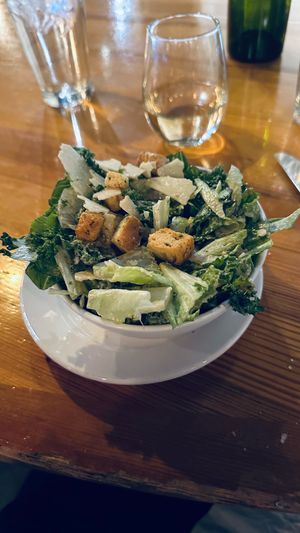 Caesar salad featuring house parmesan.  at Watercourse Foods in Denver