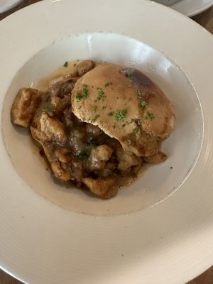 Chicken and biscuits with gravy   at Watercourse Foods in Denver
