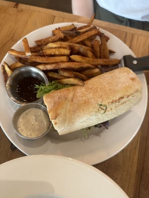 Turkey and Brie sandwich with jam, fries with aioli   at Watercourse Foods in Denver
