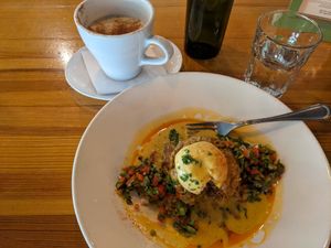 Chorizo polenta plate w/chai latte at Watercourse Foods in Denver