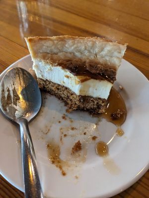 Half eaten cheesecake/carrot cake at Watercourse Foods in Denver