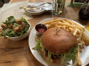 Classic burger with caesar side  at Watercourse Foods in Denver
