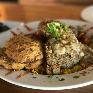 Chicken Fried Seitan with Biscuits and Gravy at Watercourse Foods in Denver