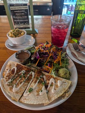 Quesadilla (sour cream is extra $) with side salad, and a side cup of mac at Watercourse Foods in Denver