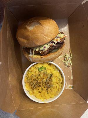 Hot chicken sandwich, really good. It’s kind of a dry rub lightly fried sandwich with bbq sauce and coleslaw. Needs some extra sauce. I got ranch but hot sauce would be good too. at Watercourse Foods in Denver