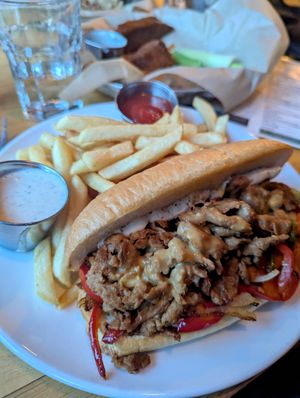 Philly sandwich and fries at Watercourse Foods in Denver