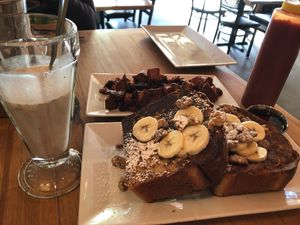French toast, chai shake and side of sweet potatoes home fries. at Watercourse Foods in Denver