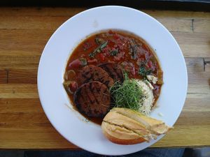 Cajun-style Etouffee with a baguette at Watercourse Foods in Denver