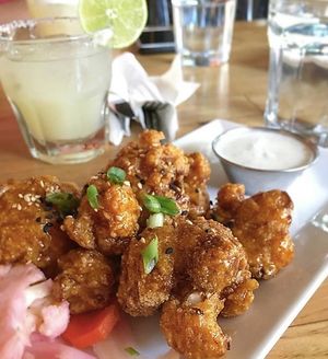Pro tip: Go during happy hour for cheap cauliflower wings and margaritas! at Watercourse Foods in Denver