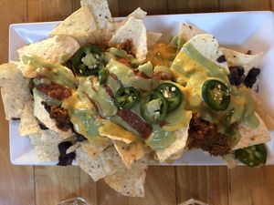 Happy hour nachos  at Watercourse Foods in Denver