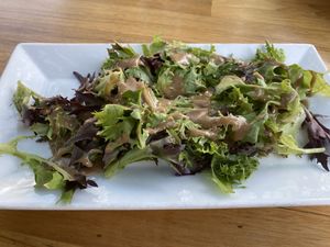 Side salad with maple Dijon dressing at Watercourse Foods in Denver