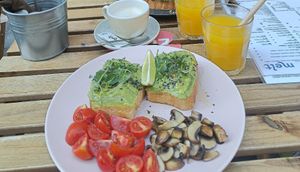 Avocado toast with extra tomatoes and mushrooms at Melt Cafe in Zagreb