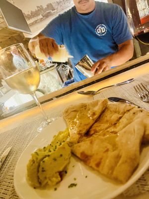 Obstinant Flatbread- Olive oil flat bread with white bean puree.  at The Obstinate Daughter in Sullivans Island