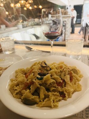 Chef will always make a vegan pasta dish by request. This one was an olive oil base campanelle pasta with wild mushrooms, green olives, roasted red peppers and calabrian chiles.  at The Obstinate Daughter in Sullivans Island
