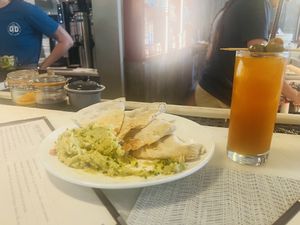 Butterbean, sea salt, and olive oil flatbread and heirloom tomato mocktail  at The Obstinate Daughter in Sullivans Island