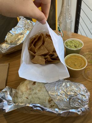 Burritos, chips, gauc and queso! at Burrito Burrito at Wizard Burger in Albany