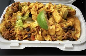 Roswell Nacho Nachos, Southwest “Ground Beef,” House Queso, Beans, Lettuce, Corn Tortilla  at Burrito Burrito at Wizard Burger in Albany