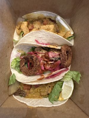 Top to Bottom: Roswell taco,  space cowboy taco, philluminati taco (my favorite)  at Burrito Burrito at Wizard Burger in Albany