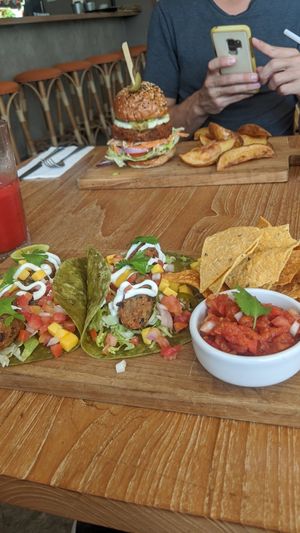 Vegan tacos, and vegan burger with sides at Unni's in Phuket