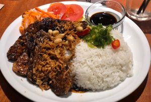 Dau Hu; black soy tempeh, with rice  at MeMe Vietnamese Food in Rotterdam